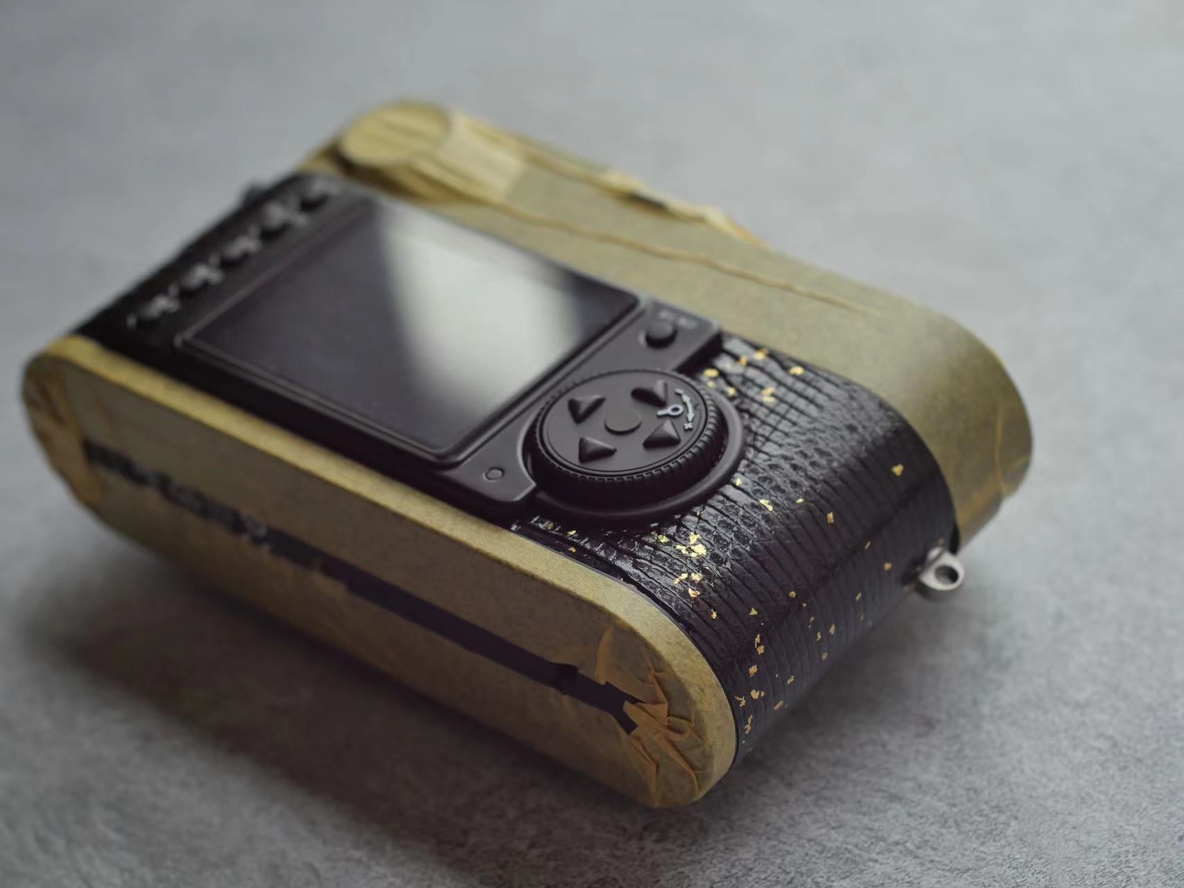 Leather art replacement with gold sprinkled lizard skin material/black