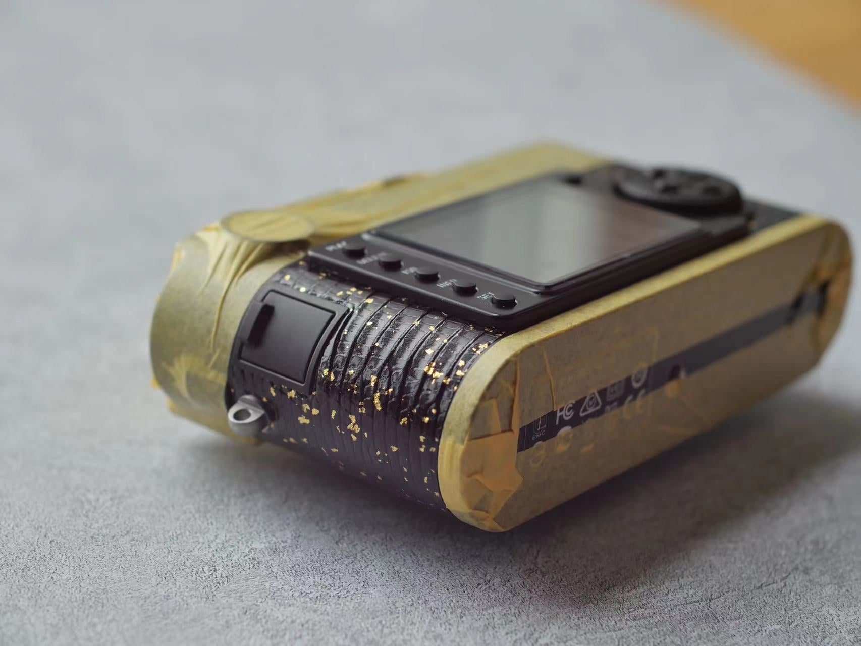 Leather art replacement with gold sprinkled lizard skin material/black