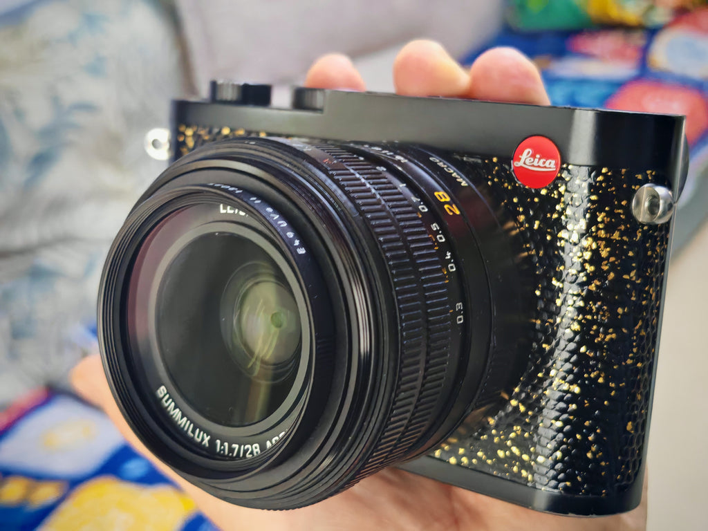 Q2 Leather art replacement with gold sprinkled lizard skin material/black
